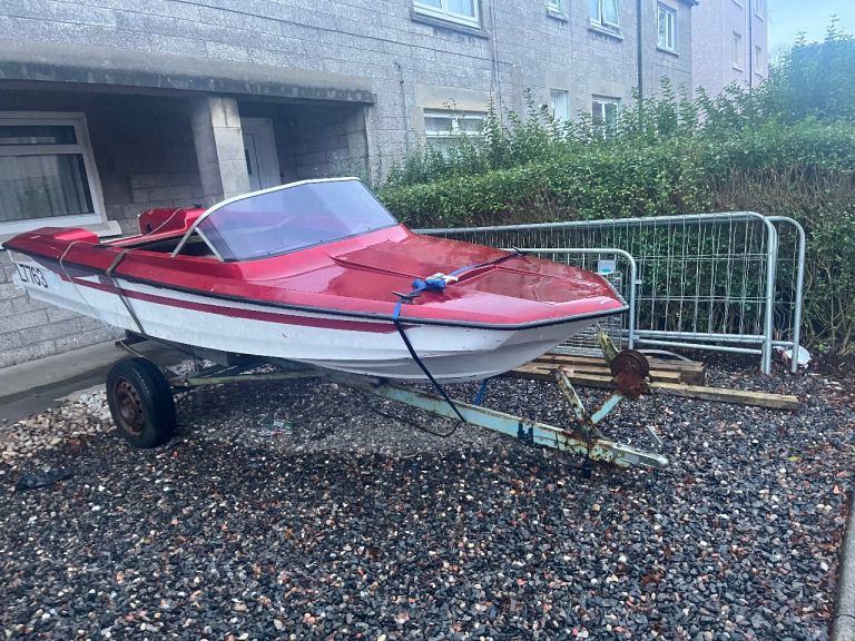 Boat trailer and old boat 