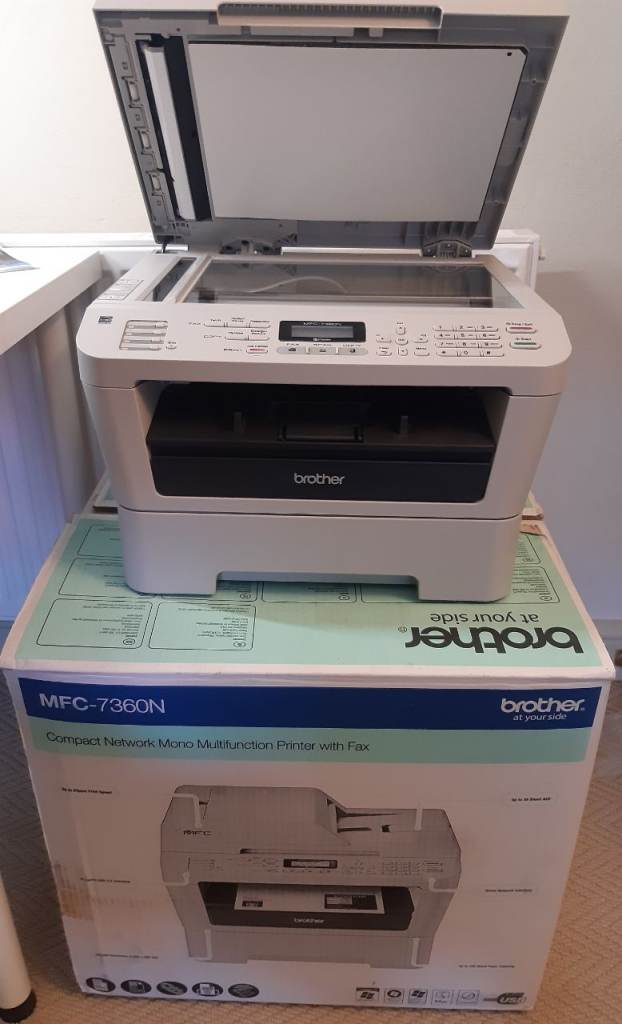 Brother MFC7360N monochrome printer, scanner, copier, fax. Networkable via ethernet.