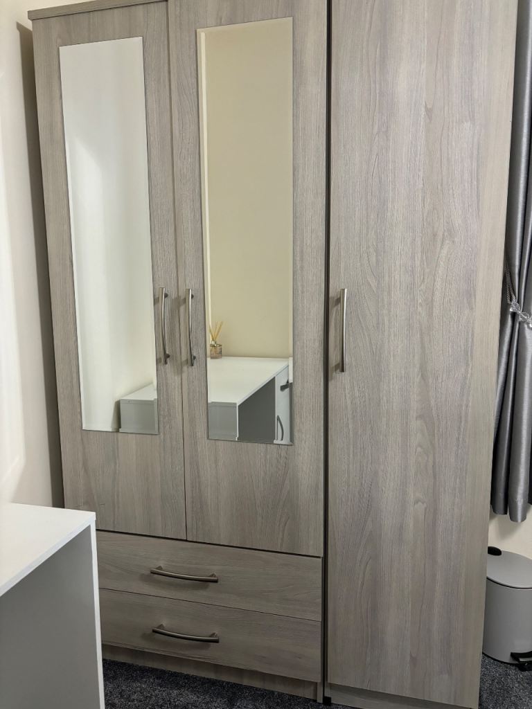 Wooden wardrobe with mirrors