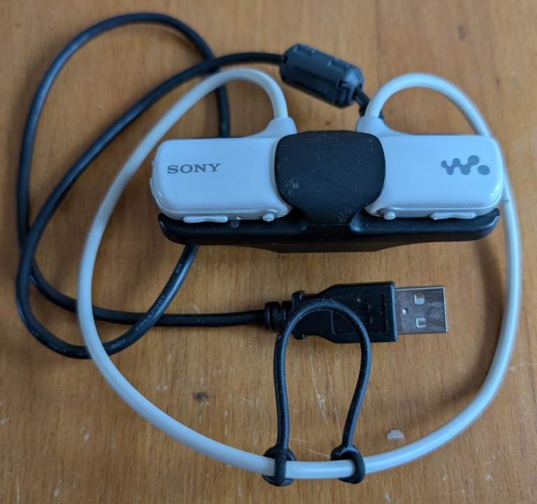 Sony NWZ-W273 Waterproof, All-in-one Sports MP3 Player with Built-in Headphones & USB Charging Dock