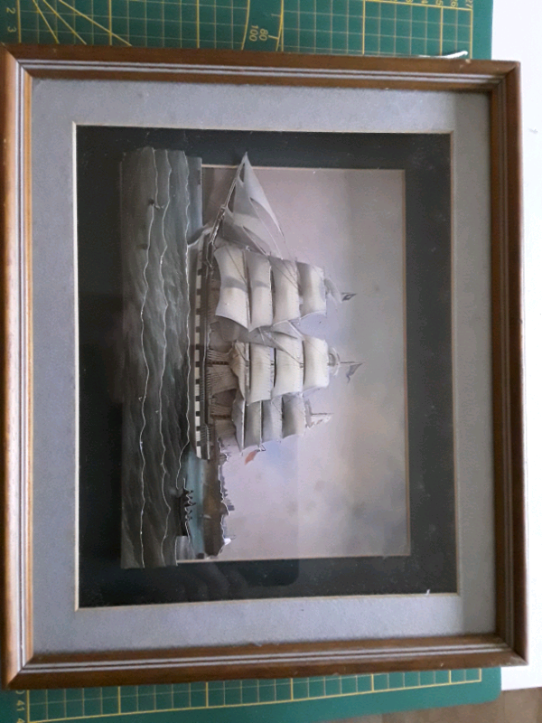 A GLASS CASED SHIP ON HIGH SEAS