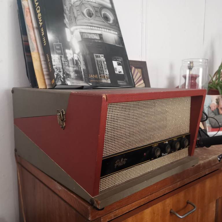 Vintage portable record player with built in speakers