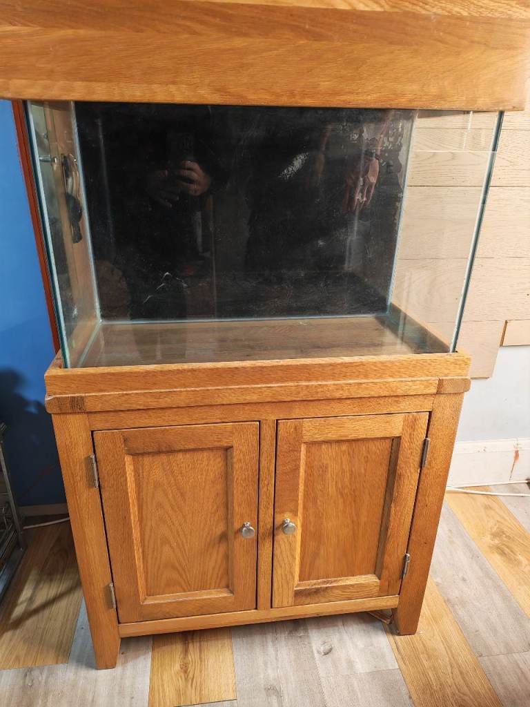 Fish tank with oak cabinet