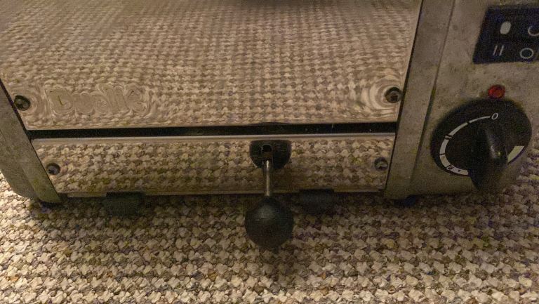 Dualit 3 slice toaster with sandwich holder.