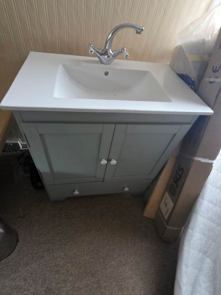 Vanity sink unit with taps. 