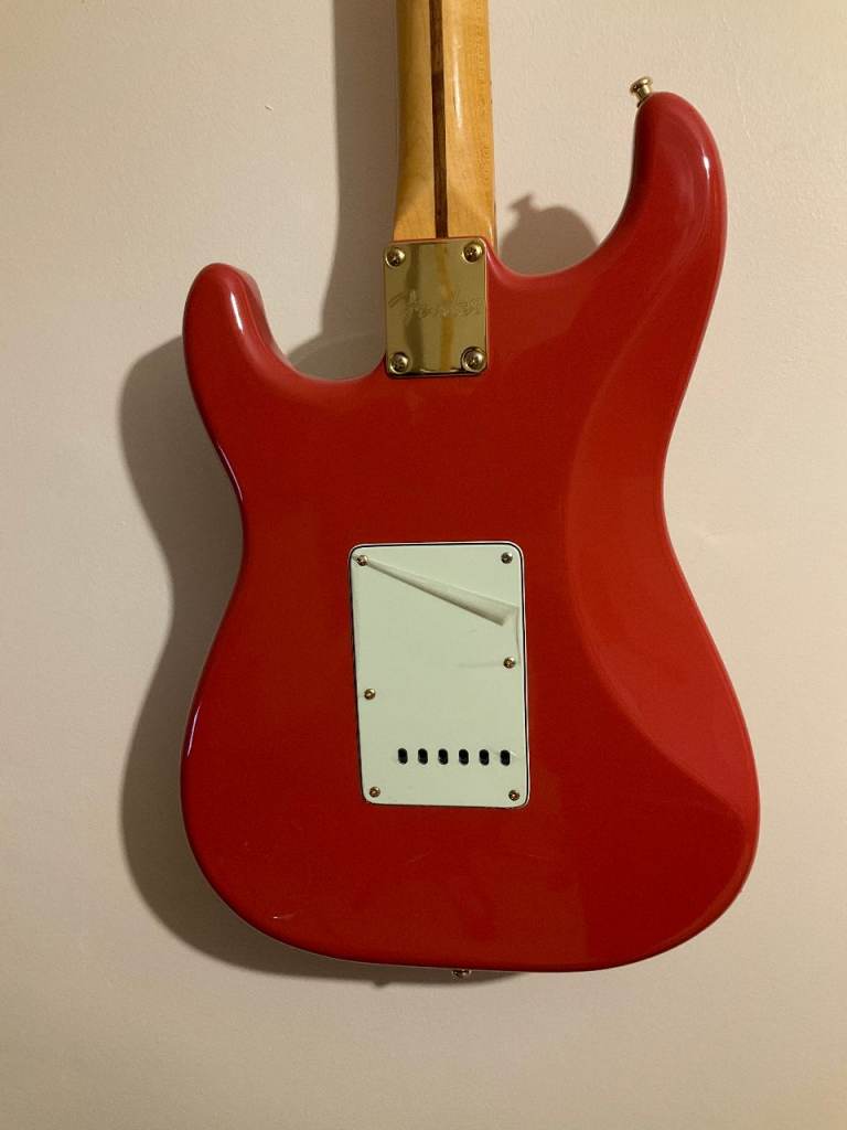 Fender Stratocaster with upgraded Fender gold hardware   