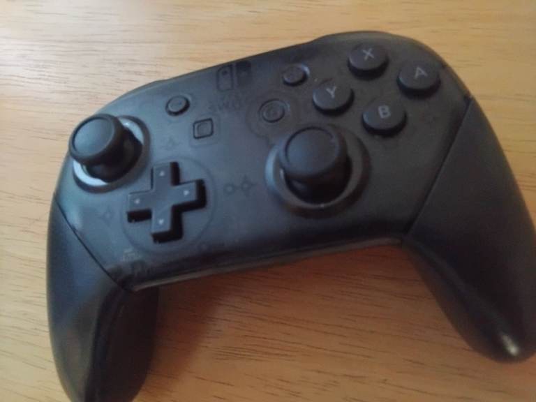 Nintendo Switch Pro Controller (read description)