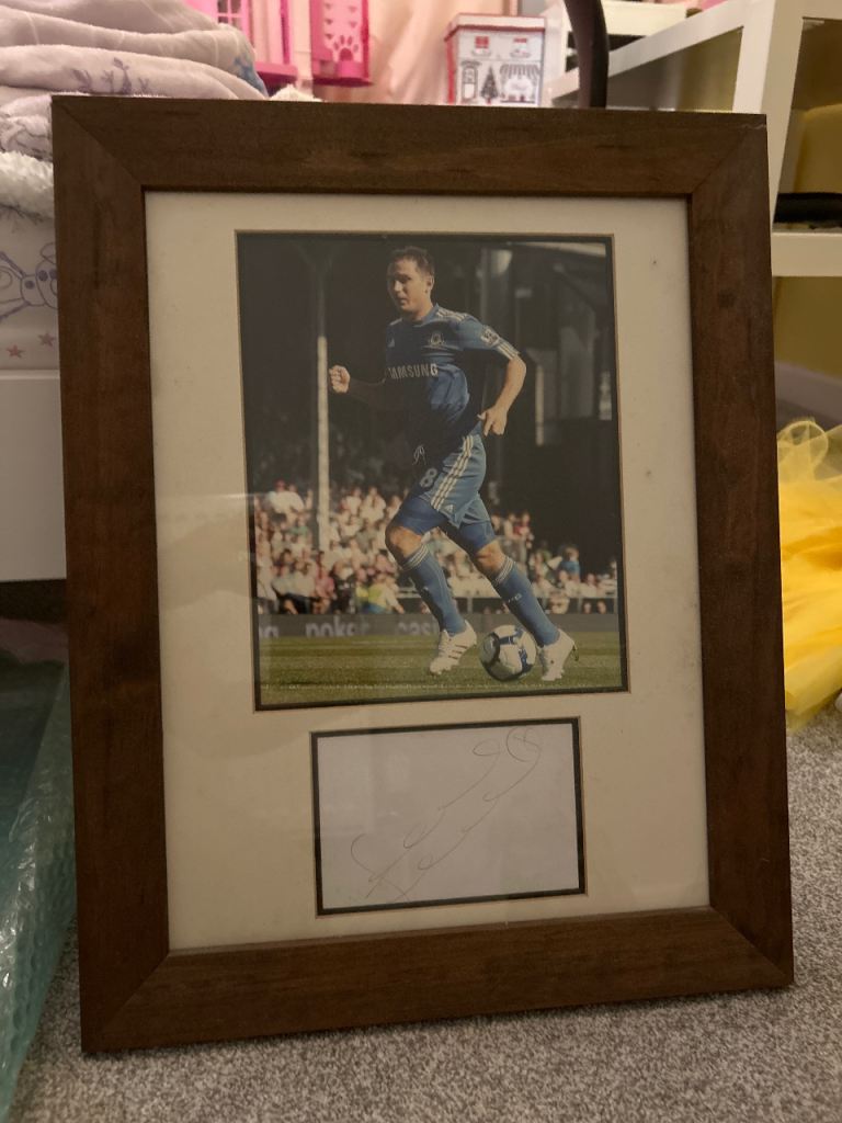 Framed Football Player Photo with Autograph – Good Condition