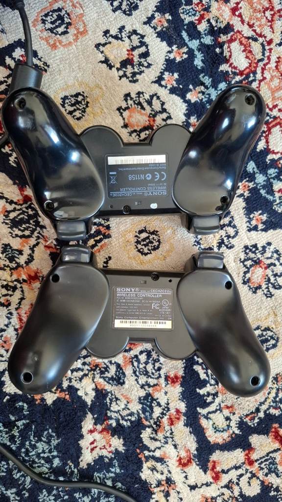 Sony PS3 with 1 extra controller and games