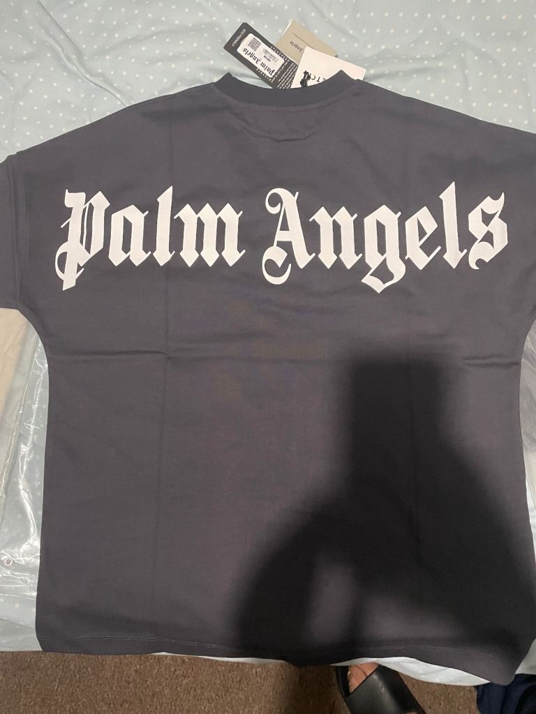 Brand new P Angels t-shirt size L