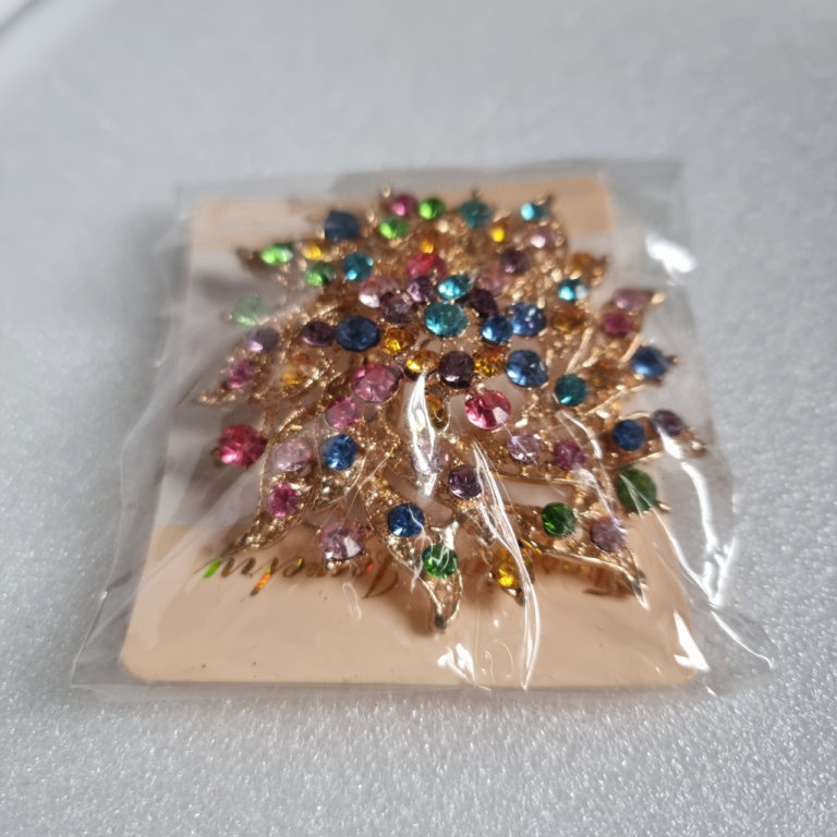 Multicoloured crystal broach. Faux gold plating. Party. Asian weddings