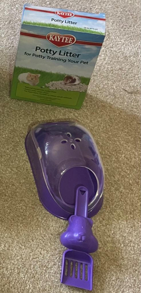 Hamster potty with litter.