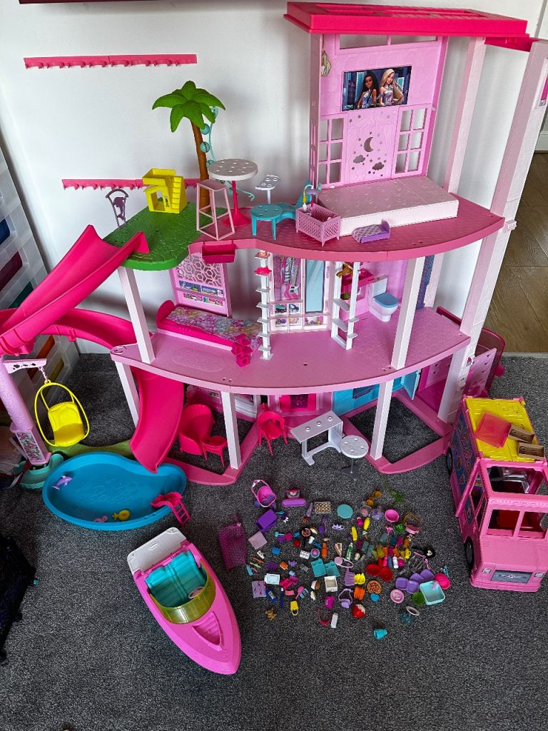 Barbie dream house 3 story plus Barbie camper van and boat 