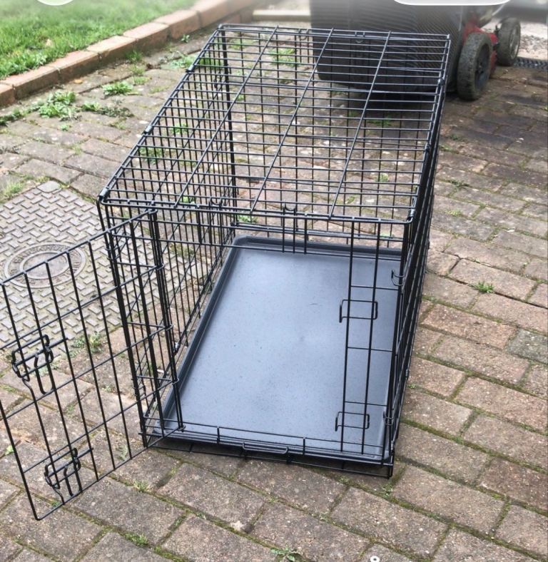 Small dog crate. Not used much. Size in photos