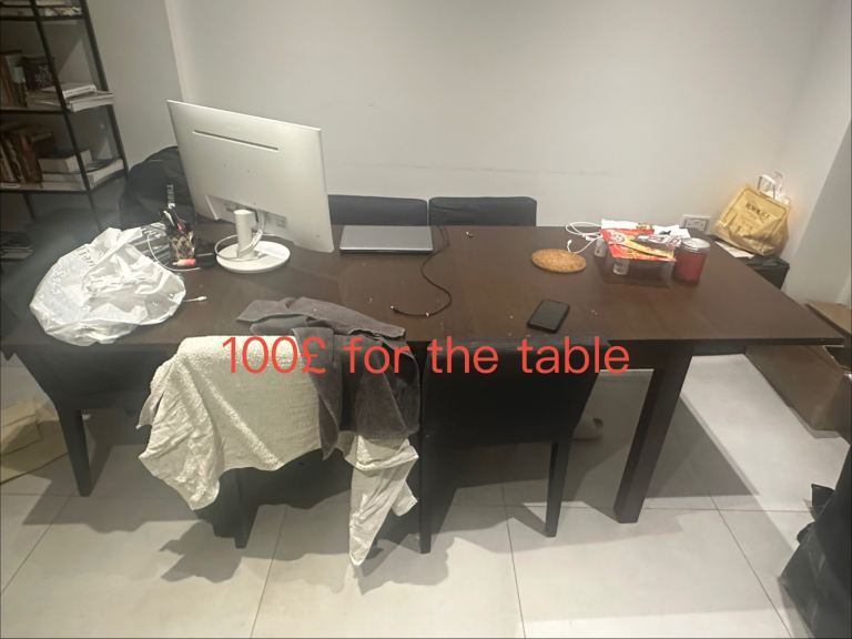 image for Long dining table and a set of chairs.
