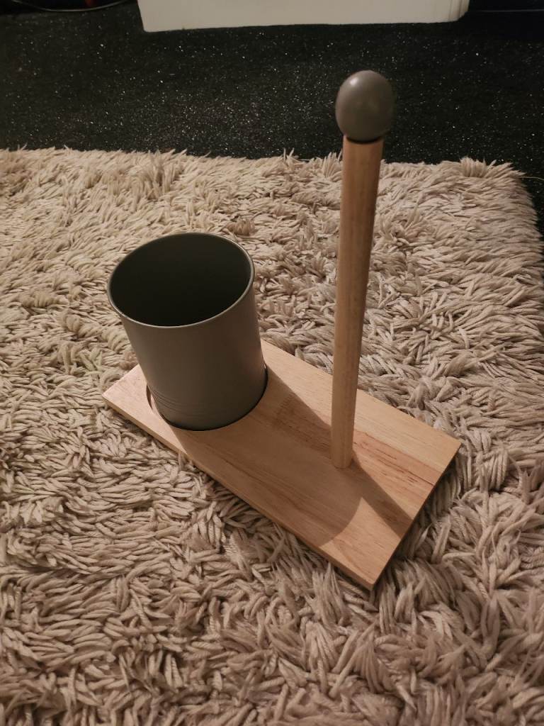 Kitchen roll and utensils holder