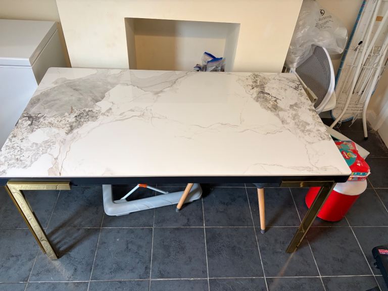 A beautiful marble dining table. Used very good