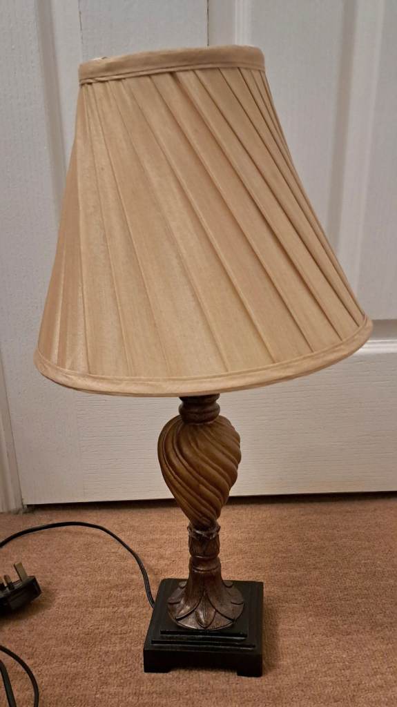 Wooden base table lamp with gold pleated shade