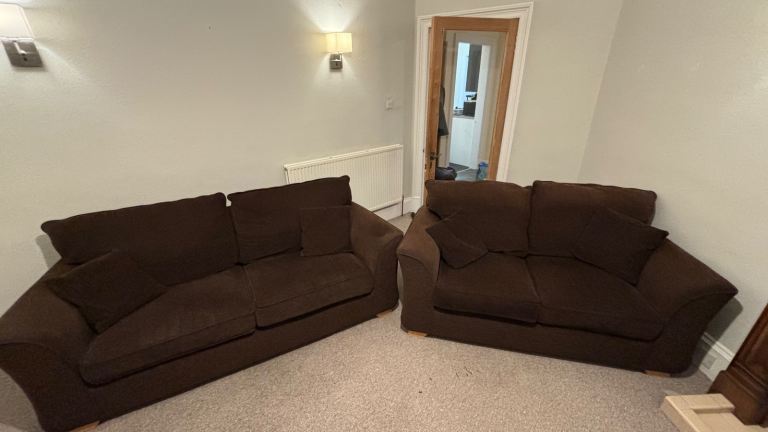 2 matching brown fabric sofas