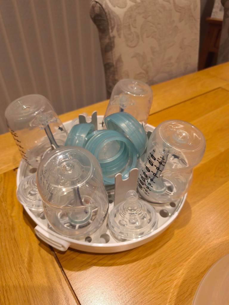 Tommee tippee bottles and steriliser 