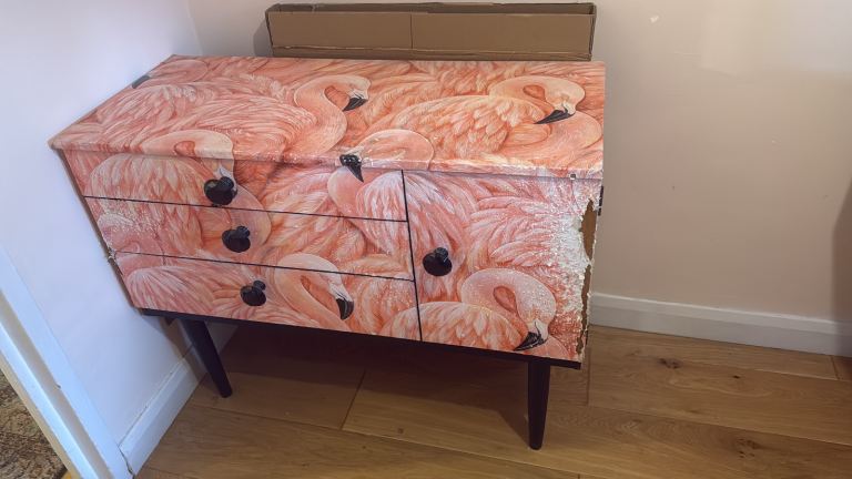 FREE sideboard covered in flamingo print wallpaper 