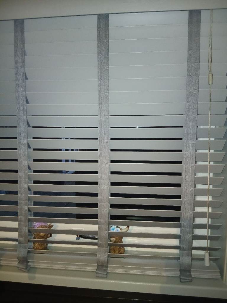 Grey faux wood blind 