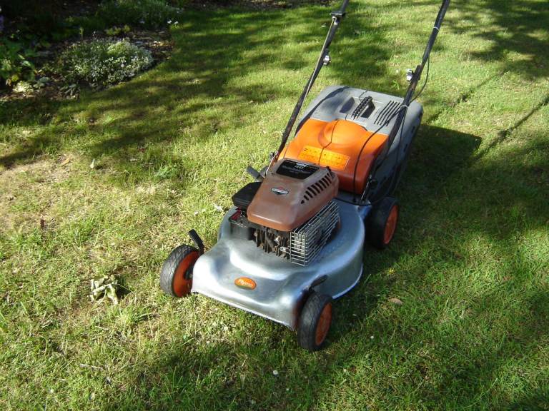 FLYMO Petrol Powerdrive 46cm. cut Rotary mower, Briggs & Stratton engine, VGC, All Good.