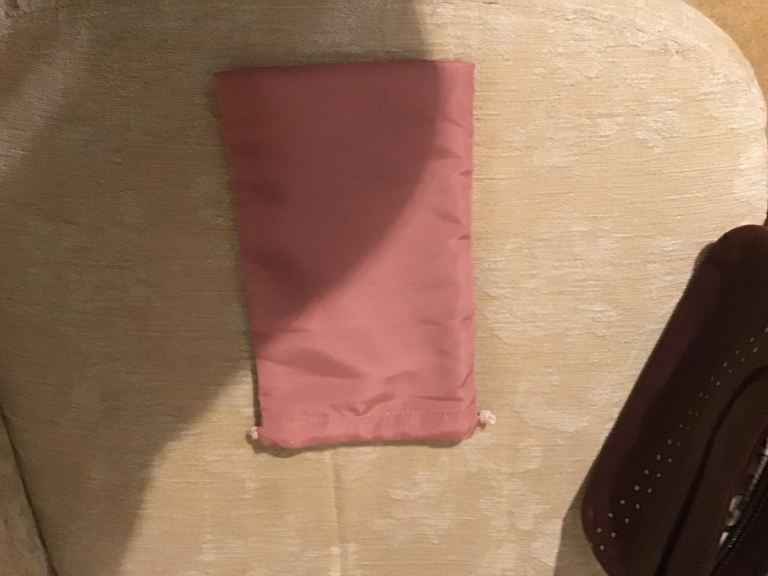 RADLEY CLUTCH BAG. MAROON COLOUR. USED A LITTLE. SELL FOR 40