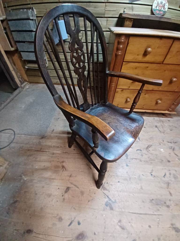 Beech wheel back chair.