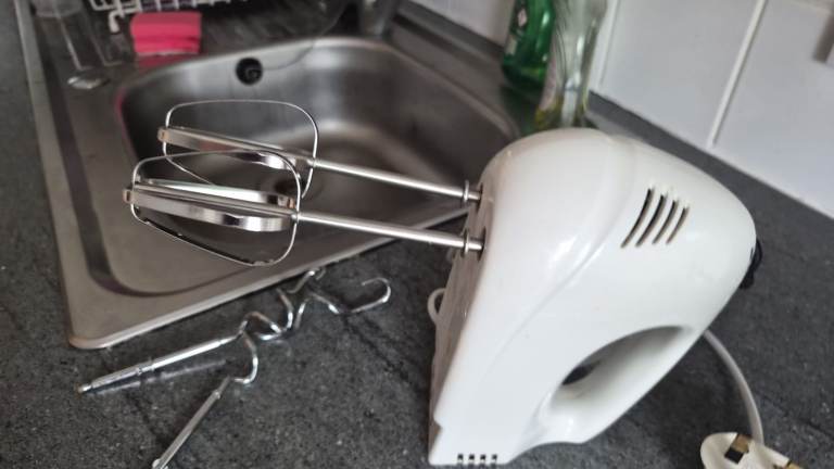White electric hand mixer
