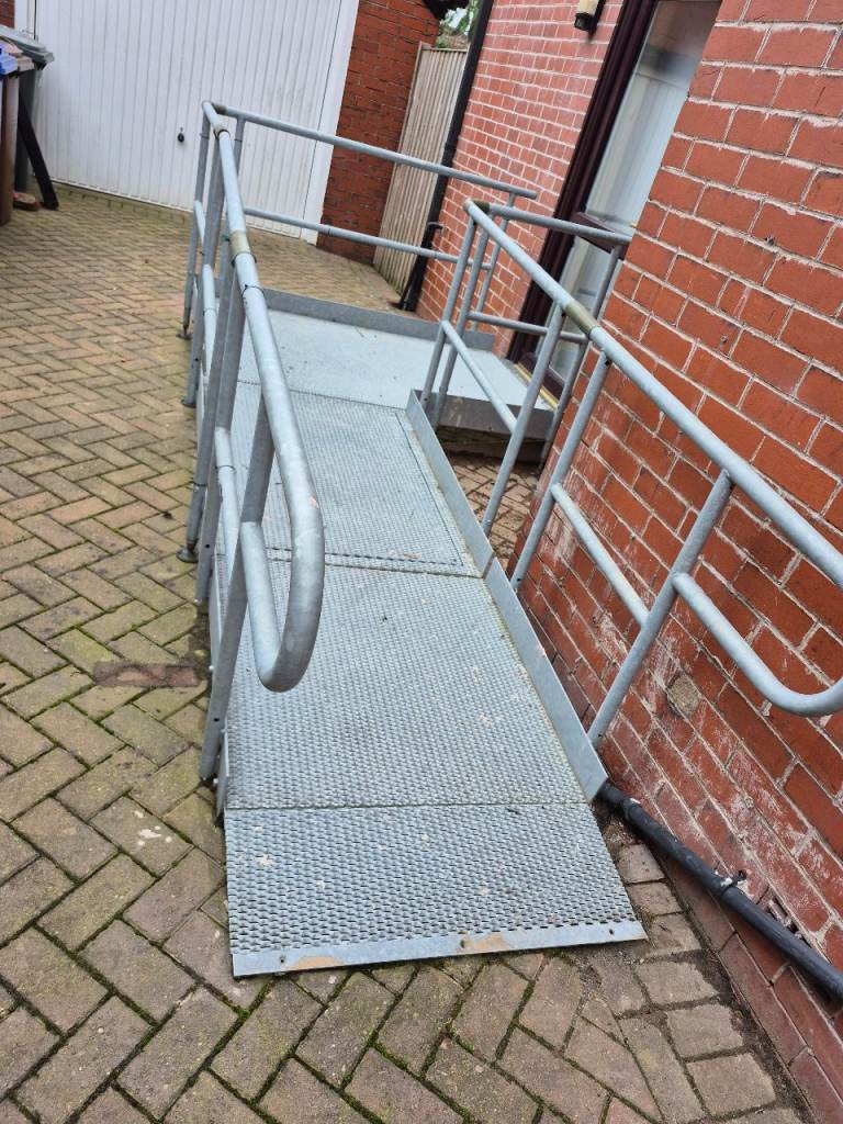 Galvanised wheel chair ramp.
