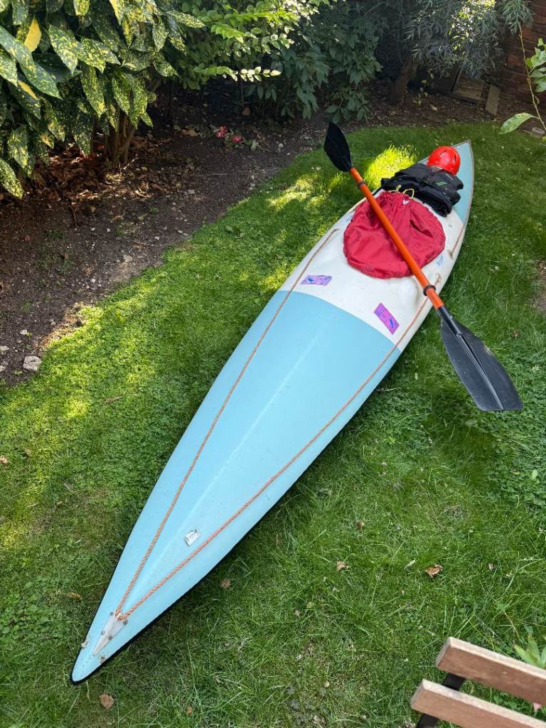 Trident Maritime Kayak with Paddle, Life Vest, and Helmet – Good Condition