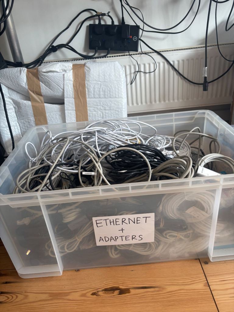Box of Ethernet Cables and Adapters – Good Condition