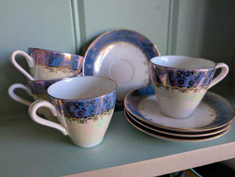 Four vintage blue lustre coffee cups