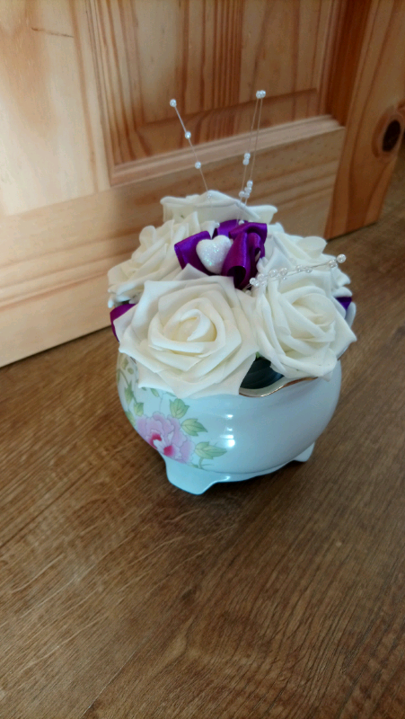 Vintage Pottery Vase with artifical flowers 