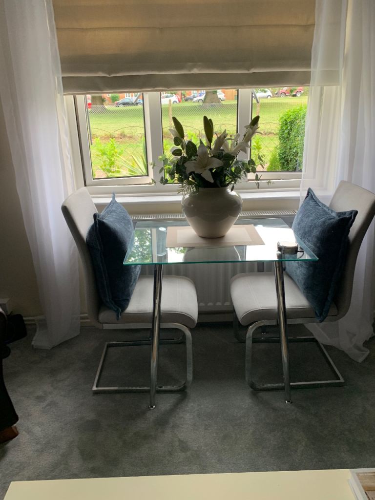 Dining table and 2 chairs. 