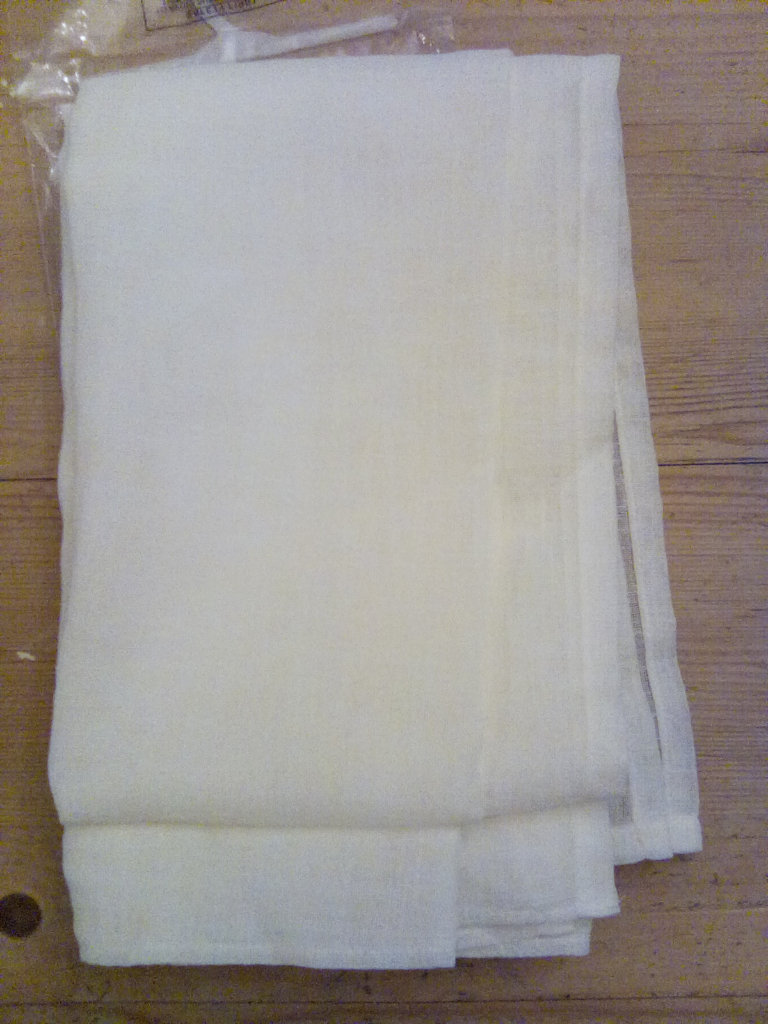 Brand new single voile panels in cream 