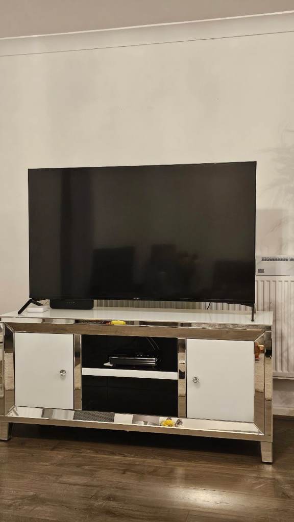 Lovely Mirrored and white glass TV unit with 2 storage cupboards