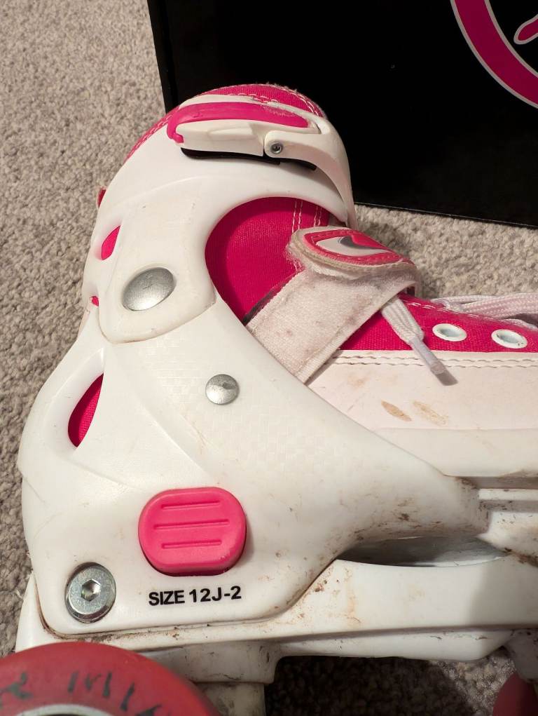 Adjustable quad rollerskates size 12-2