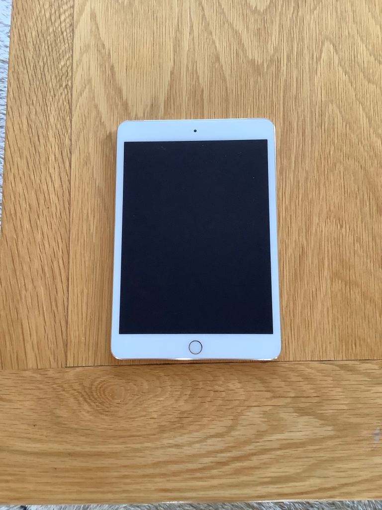 As new condition IPad Mini Gold Version 