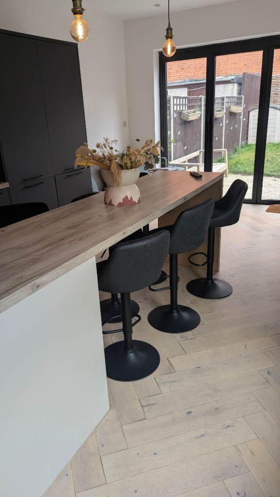 Set of 6 Adjustable Black Bar Stools – Good Condition