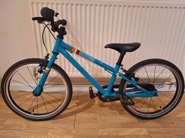 The Islabikes Cnoc 18 Teal Blue Lightweight Kids Bike