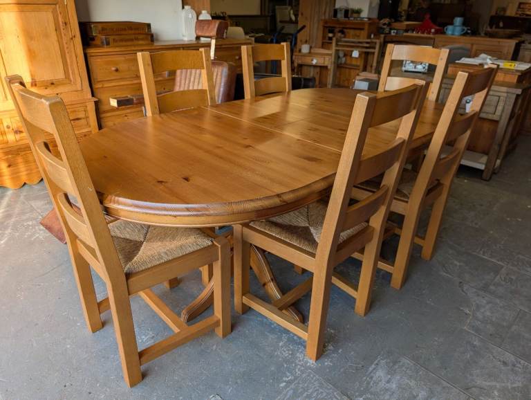 Solid pine dining table and 6 chairs 
