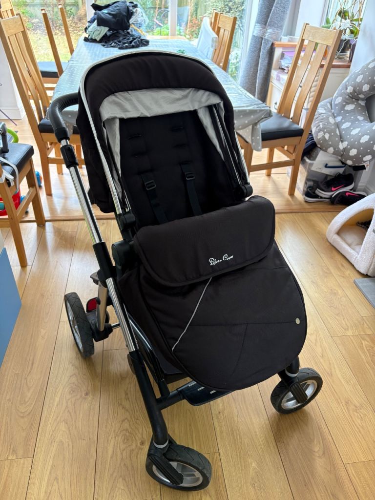Lovely silver cross travel system.
