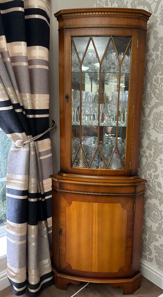 Yew wood corner display cabinet - glass front