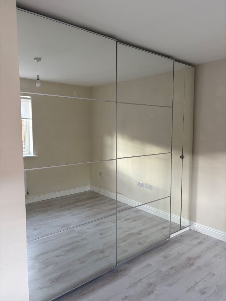 Ikea PAX wardrobes with sliding mirror doors