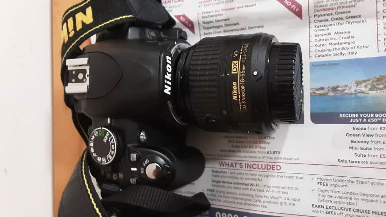 Nikon D3100 14 megapixel including Nikkor 18-55mm lens attachment