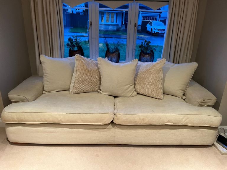 2x4seater cream fabric sofas with removable covers