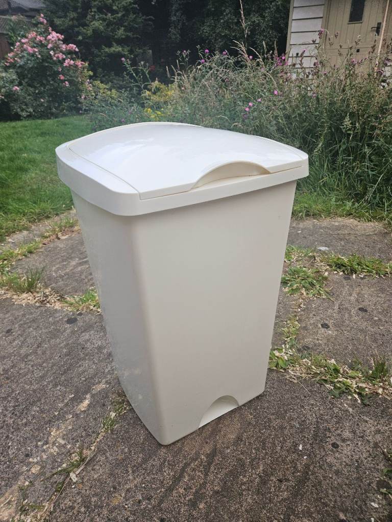 Free cream plastic kitchen bin