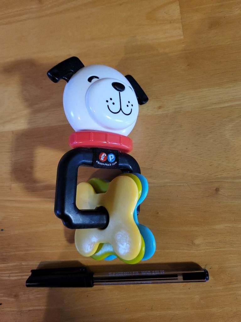 Fisher price baby dog chewy rattle toy. Good condition.
